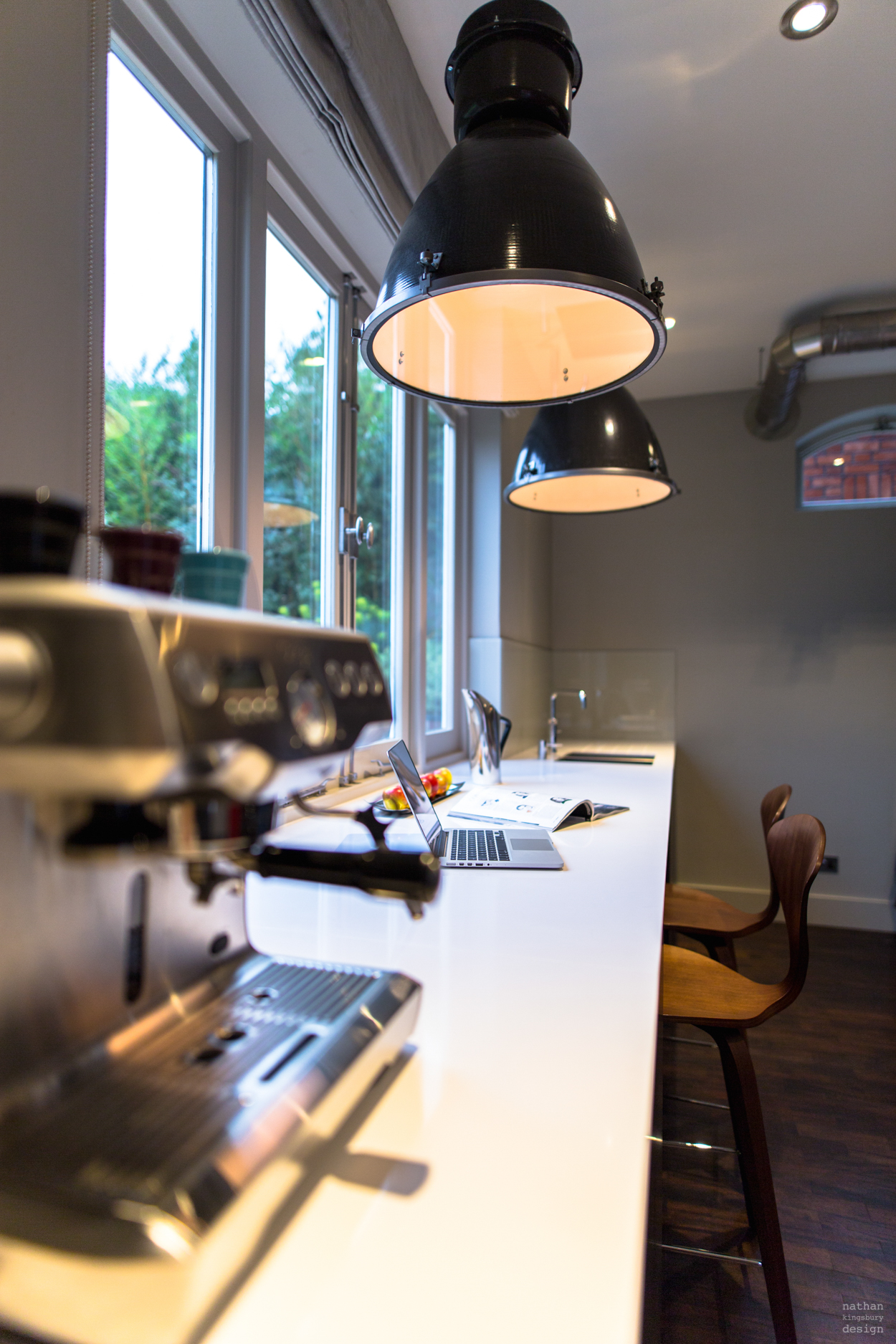 custom made white kitchen worktop with vintage industrial lights reigate surrey